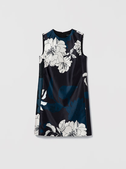 Navy sleeveless dress with white floral pattern on a light gray background