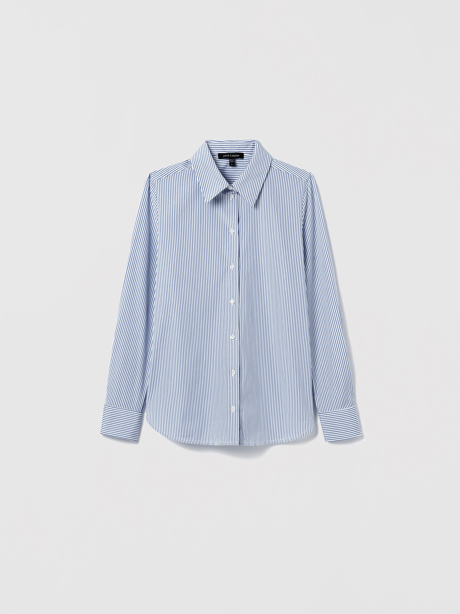 Blue and white striped shirt on a light gray background