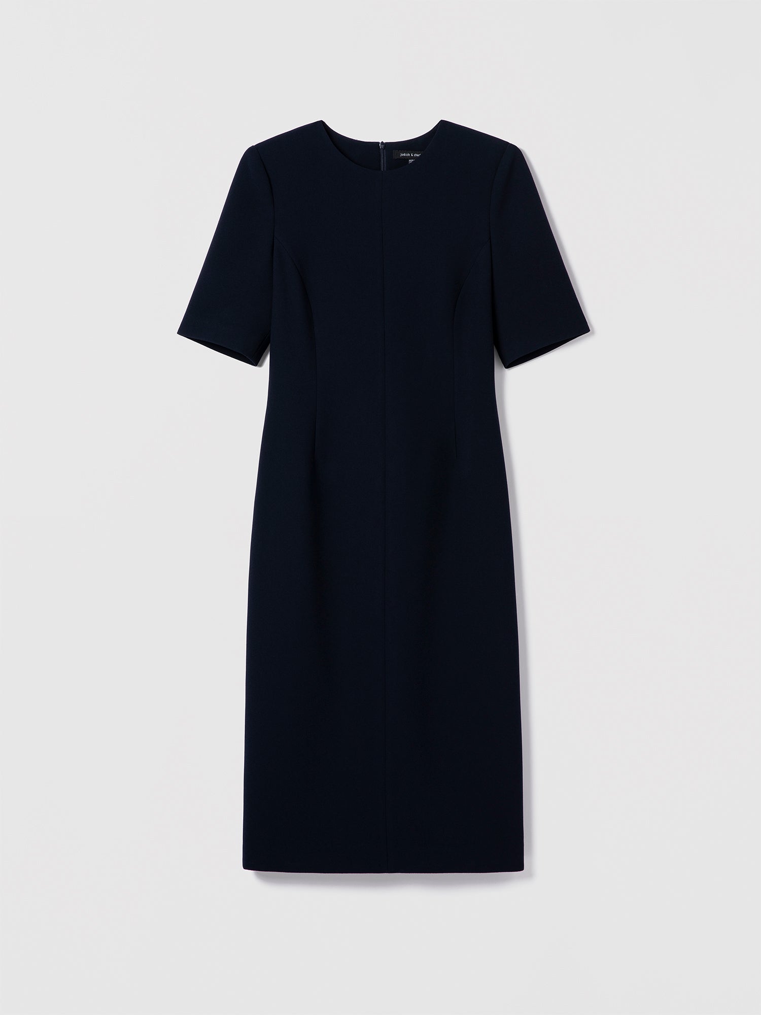 Navy fitted stretch crepe dress by Judith & Charles with elbow-length sleeves, crew neck, front darts, and invisible back zipper.