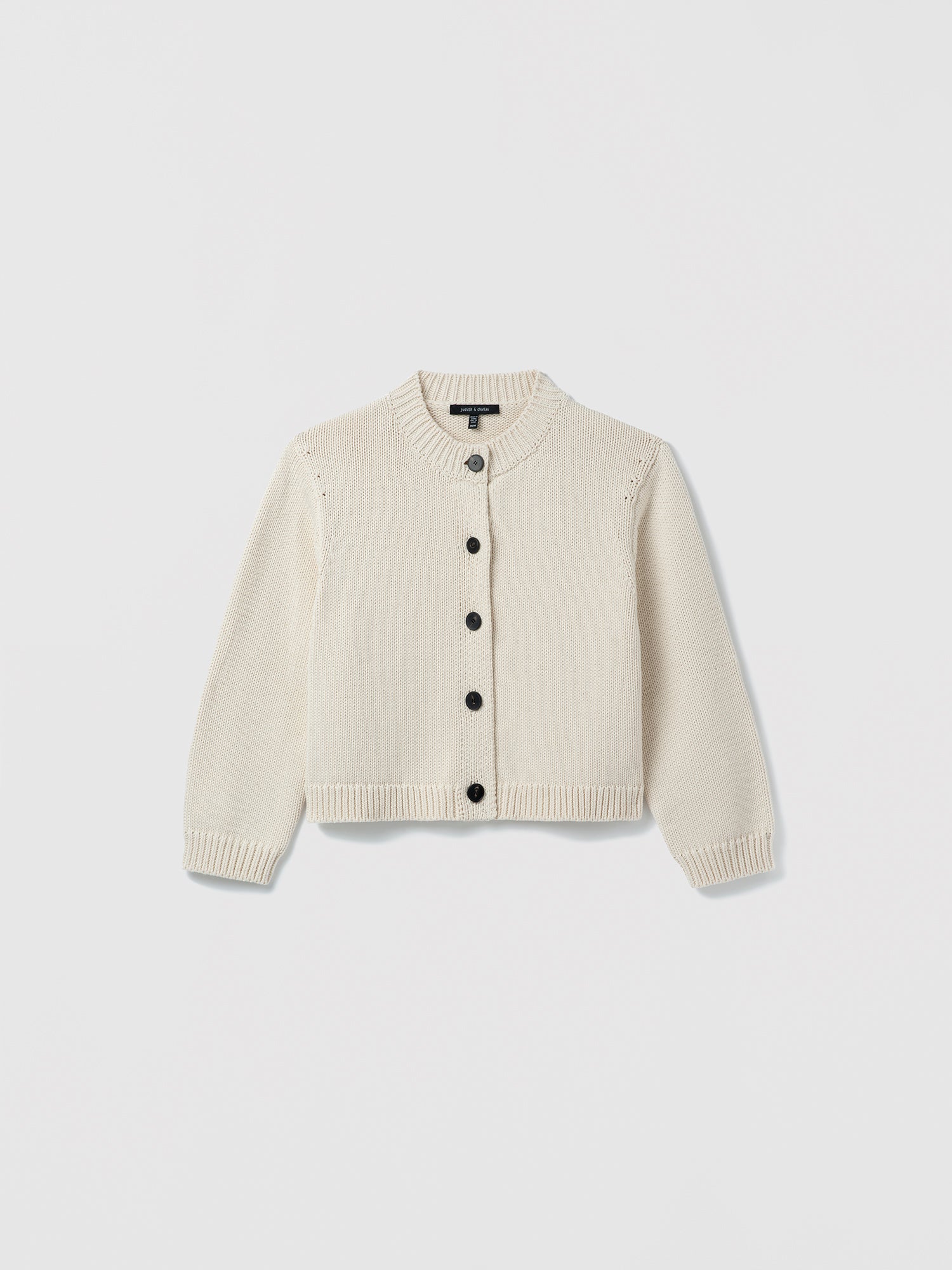 Pearl cardigan on a light gray background