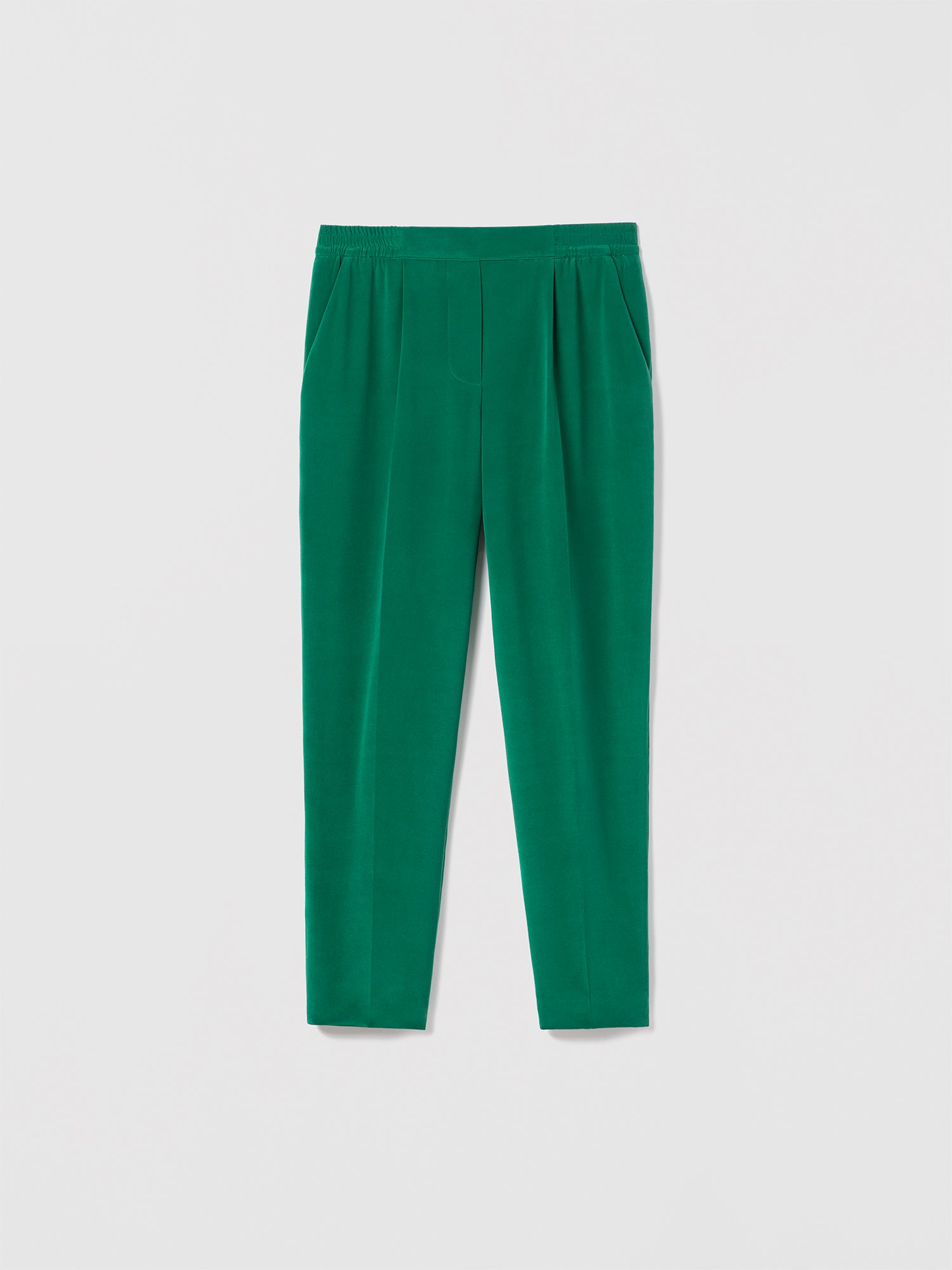 Judith and Charles Jazzy Green Seville Pant – mid-rise, slim-leg pleated trouser in sand-washed silk with elastic waist, single front pleat, and slash pockets; unlined; 26″ inseam; made in Canada 
