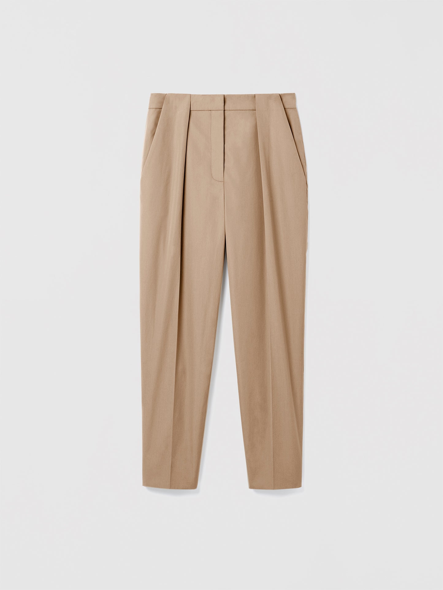 Judith and Charles Soren Pant in color sand – high-waisted carrot-shape pleated pant in poplin with slash and back welt pockets and hook-and-eye closure; made in Canada 