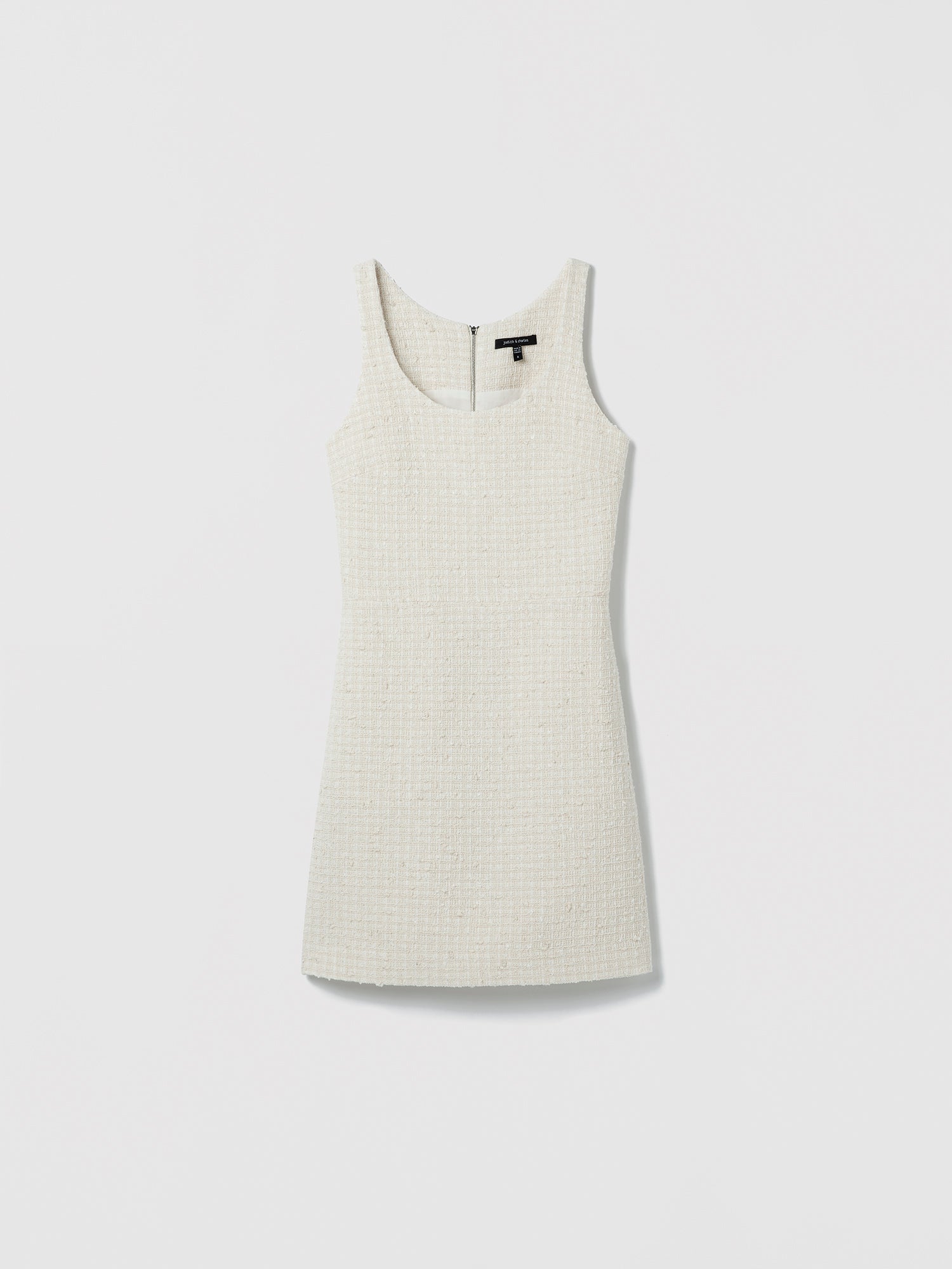 Cream sleeveless dress on a light gray background