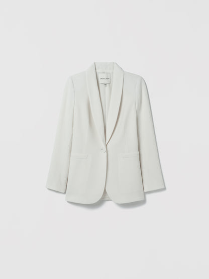 Flatshot of jacket in satin back crepe with a clean, easy fit. Finished with welt pockets, a self‑covered button, and a single back vent