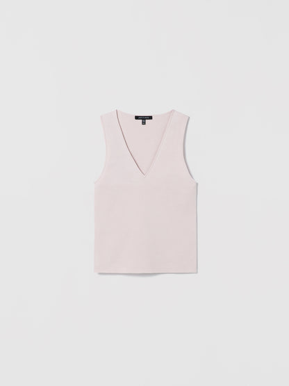 Light pink sleeveless V-neck shell top by Judith and Charles, made from a fine Italian silk-cotton blend. Features a fitted silhouette and a 21.5" back length. Style code: 266-4133.