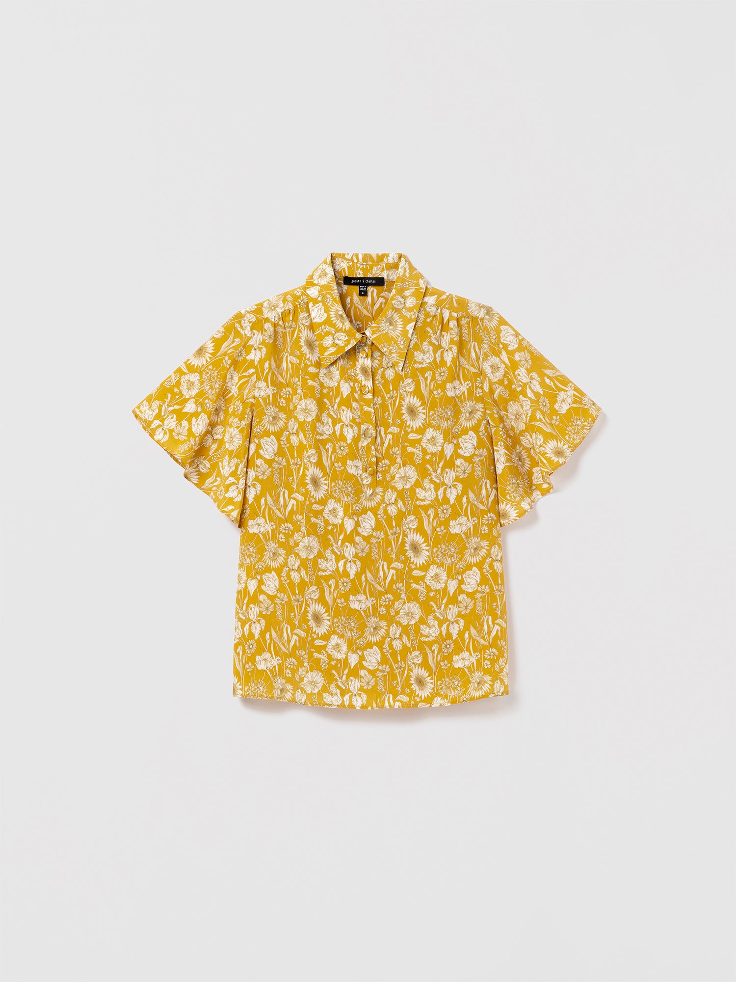 Judith & Charles Yellow Flutter-sleeve blouse in Liberty-printed Italian silk, featuring a shirt collar, button front closure, and a lightweight unlined finish — the Violet blouse, made in Canada 