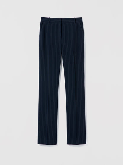 Pinstripe Navy pleated pants on a light gray background